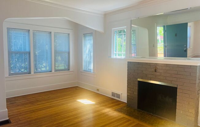Charm Galore in this Beautiful 1920s Home near Fremont. Fresh Paint inside and out! New carpet