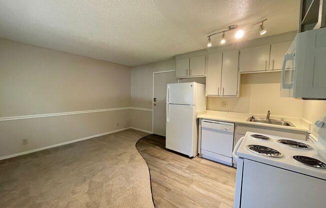 Includes Free Covered and Gated Parking Space!  $1,000 Moves You in Today!