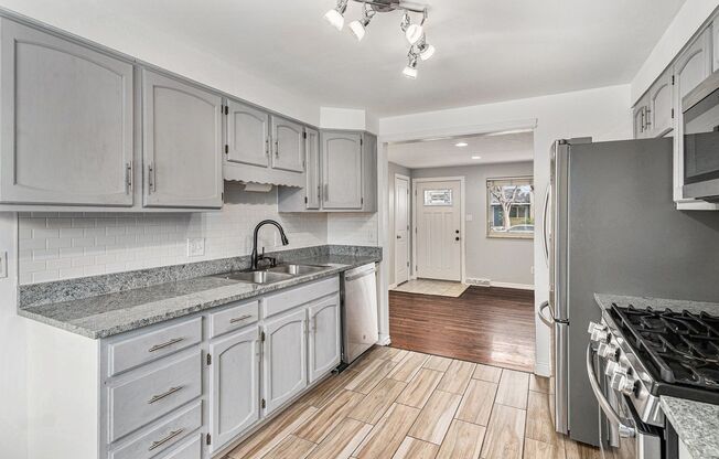 Updated Five-Bedroom Brick Ranch in the Heart of Littleton