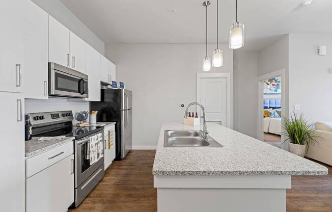 a kitchen with a counter top and a sink