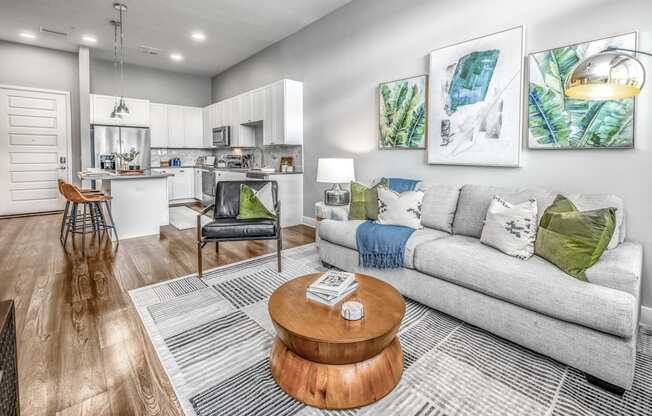 a living room with a couch and a coffee table at The Overlook, Winter Garden, FL