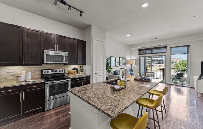 a kitchen with a counter top and a sink