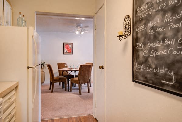 Kitchen With View of Dining Area at Desert Creek, Albuquerque, NM