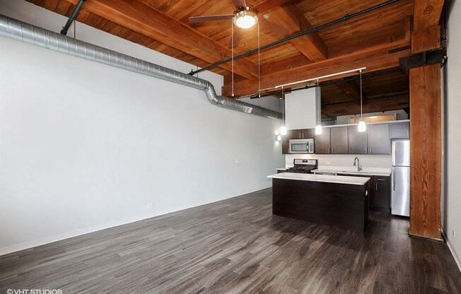 Open concept living space at Carriage House Lofts, Illinois, 60605