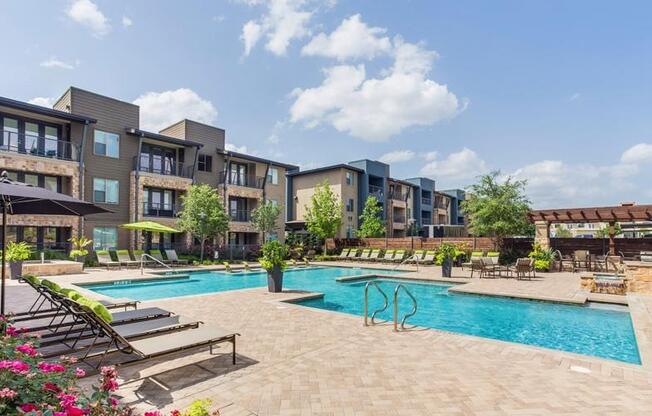 Swimming Pool With Relaxing Sundecks at Berkshire Medical District, Texas