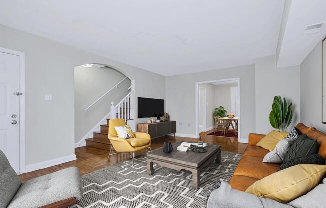 a living room with a couch and a coffee table