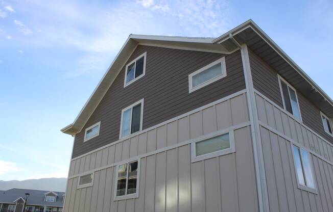 the side of a building with a sky background