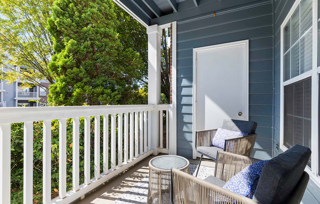 Screened-in private balconies and patios - Evergreen Lenox Park