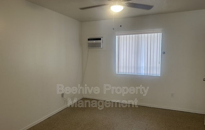 1102 E POLK ST