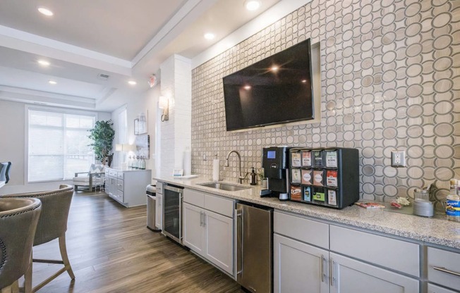 a kitchen with a counter and a coffee machine