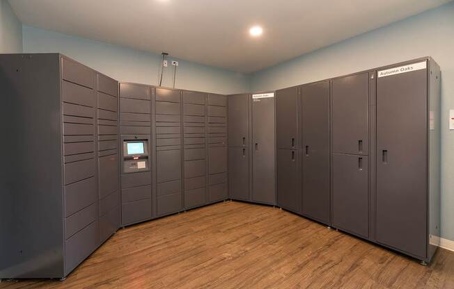 A row of brown lockers are lined up in a room at Autumn Oaks Apartments, Roseville, CA, 95678