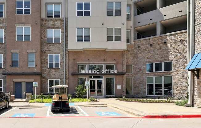 Entrance to leasing office at GreenVue apartments in Richardson, TX