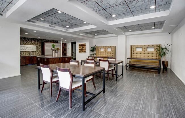 a conference room with a table and chairs