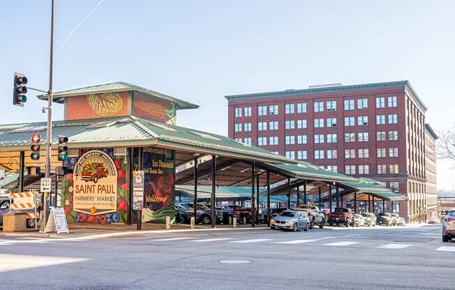a gas station on the corner of a city street at Lowertown Commons Apartments, St. Paul, Minnesota