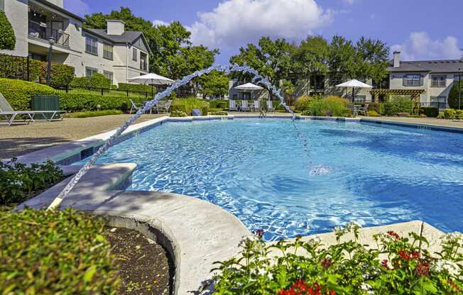 a large pool with water shooting out of it