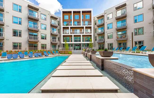 In pool lounge chairs at Windsor Preston, 7950 Preston Road, 75024