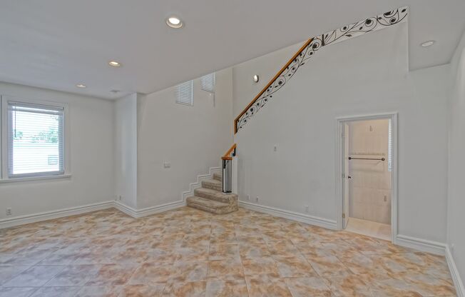 SPACIOUS & BRIGHT, TWO-STORY HOME W/ FRONT YARD, BALCONY & 2-CAR GARAGE CLOSE TO SHOPPING, FREEWAY ACCESS, RB BORDER & MINS TO BEACH!