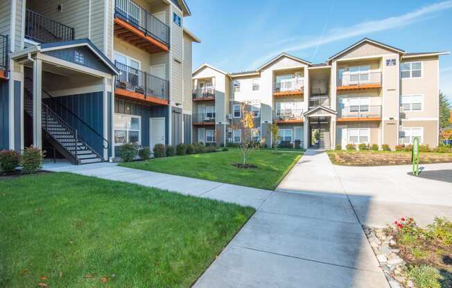 the preserve at ballantyne commons apartments exterior with sidewalk and green grass