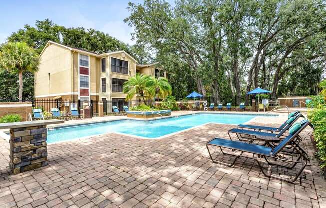 our apartments have a resort style pool with lounge chairs