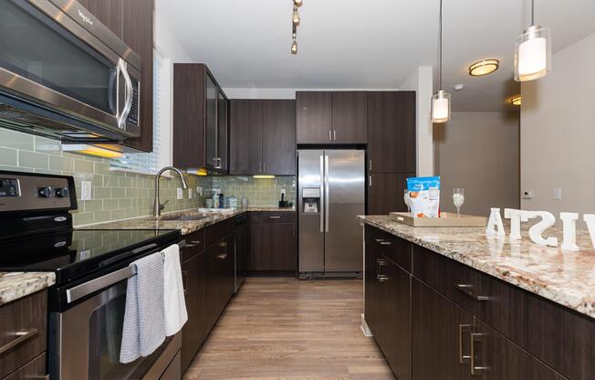 a modern kitchen with stainless steel appliances