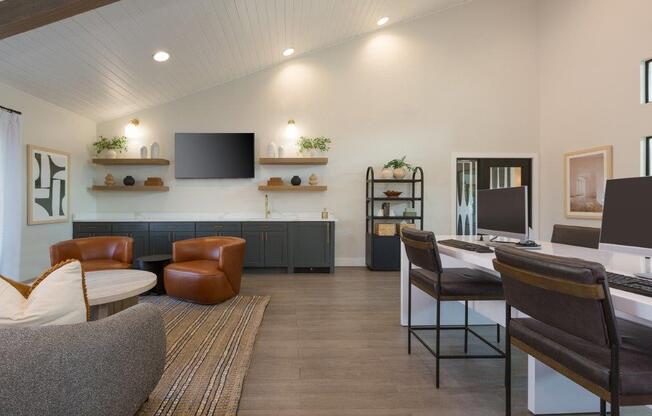 a living room with a table and chairs and a television