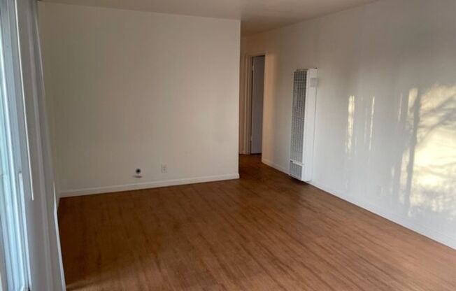 2 Bed 1 Bath apartment, Hardwood Floors throughout, with modern appliances, Conveniently located near the Elmwood neighborhood