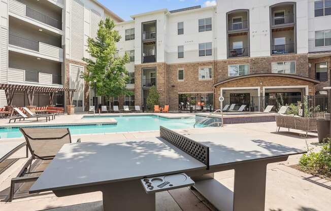 our apartments have a resort style pool and community table