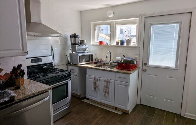 Four Bedroom with Great Outdoor Deck and Several Bonus Rooms