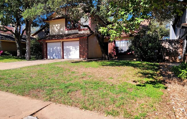 Warm & Inviting 4BR / 2.5BA Home with Covered Deck and 2-Car Garage