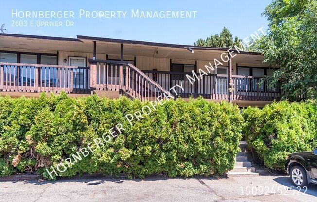 2603 E UPRIVER DR