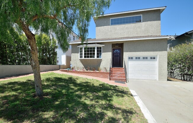 Spacious Four Bedroom Home in Manhattan Beach Hill Section!