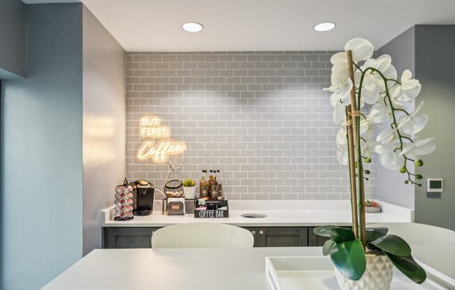 coffee station on top a white countertop in the clubroom at the Residences at Manchester Place in Manchester, New Hampshire