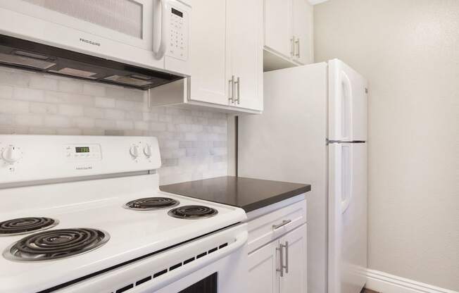 All Electric Kitchen In White at Pacific Trails Luxury Apartment Homes, California, 91722