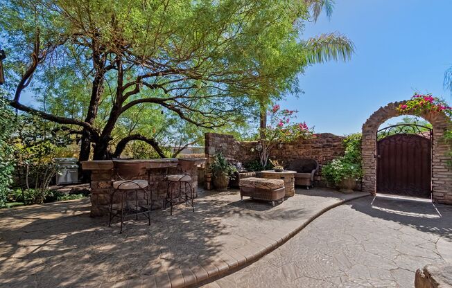 Retreat to a Private Oasis with Resort-Style Pool in an Old World Setting