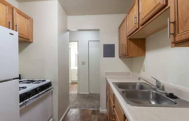 This is a photo of the kitchen in the 705 square foot, 1 bedroom, 1 bath apartment at Blue Grass Manor Apartments in Erlanger, KY.