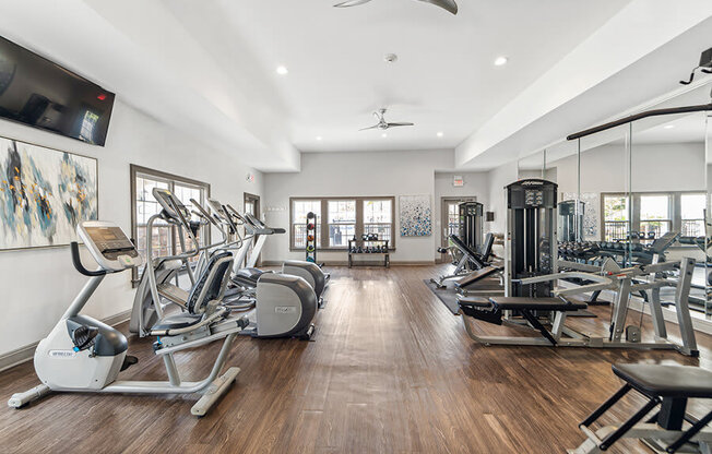 Community Fitness Center with Equipment at Lake Cameron Apartments located in Apex, NC.