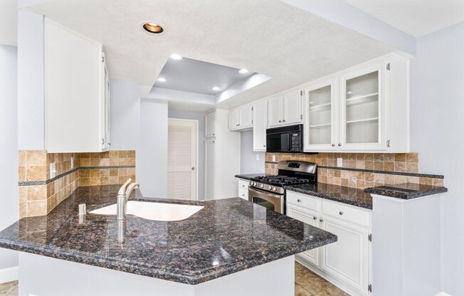 Two Story End Unit Townhome with Two Car Garage
