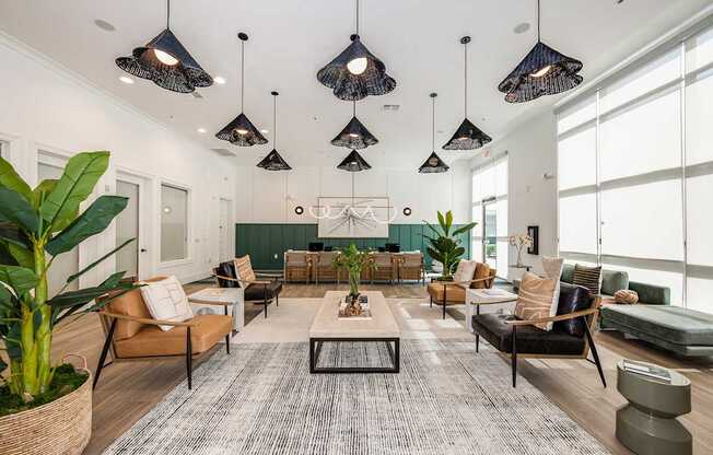 A modern living room with a large rug and a variety of seating options.