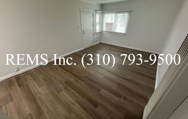 1 Bedroom Downstairs Apartment w/ (Shared) Garage Parking