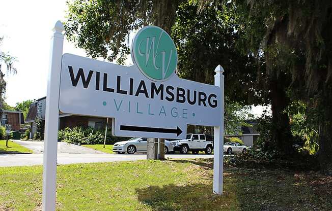 a sign for williamsburg village