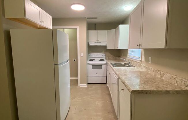 2 bedroom 1.5 bath duplex with fenced back yard