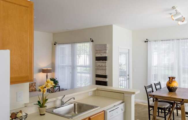 Avenel at Montgomery Square - Staged kitchen and dining