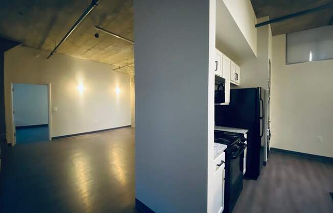 A kitchen area with a refrigerator, oven, and microwave.
