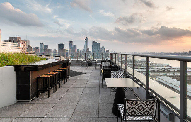 Luxury NYC apartment in midtown with outdoor grilling and entertainment amenity space overlooking Hu