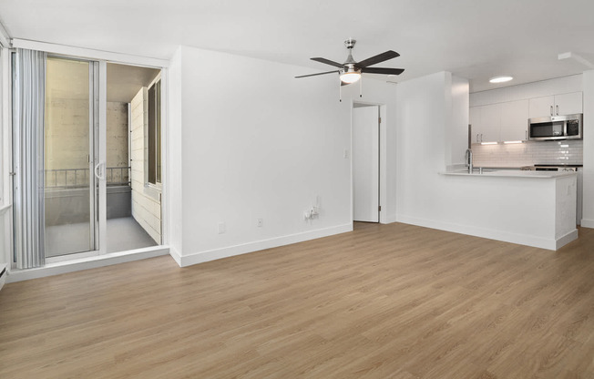 Living Room with Balcony and Hard Surface Flooring