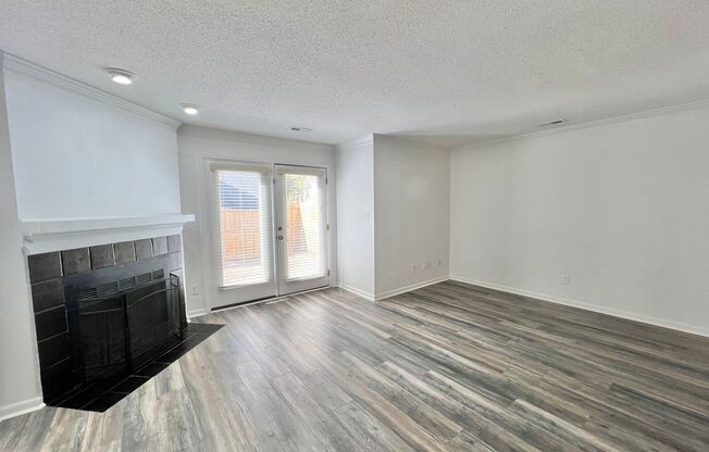 Newly Remodeled 2BD, 2.5BA Raleigh Townhome with a Fenced Yard and Private Patio in an HOA Community with Amenities