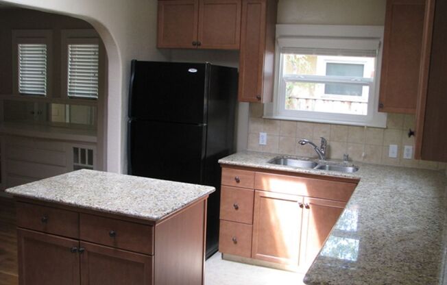 This Charming Spanish style home is located in the Tower District just across the street from Fresno City College