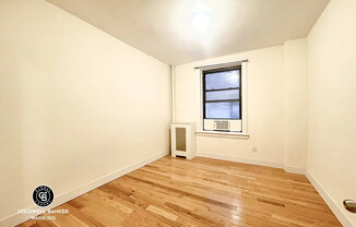 528 W 111 ST
