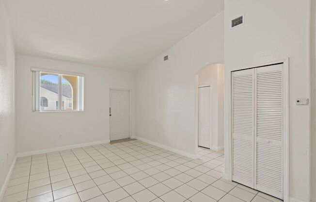 2-bath condo on the 2nd floor with a newly renovated kitchen featuring modern cabinets and granite countertops.