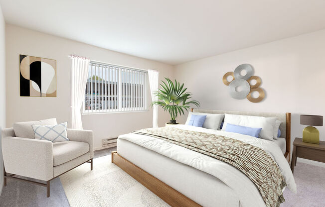 A bedroom with a large bed, a chair, and a plant.